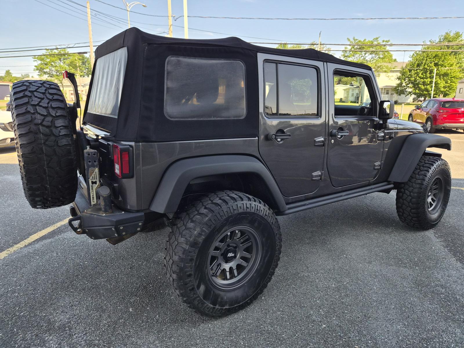 Jeep Wrangler Unlimited Sport 2014 — photo 4