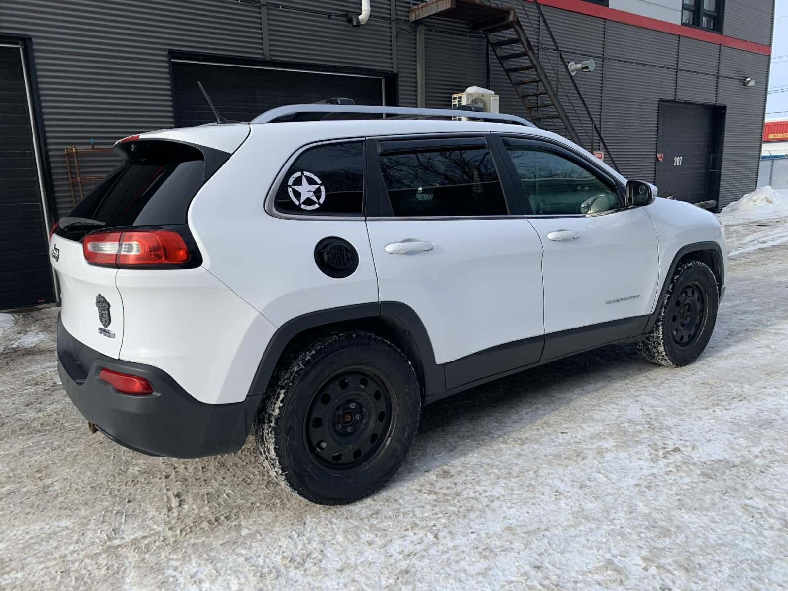 Jeep Cherokee North 2014 — photo 7